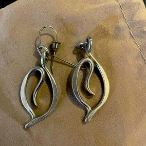 Aluminum dangle earrings purchased at an art show in SoCal